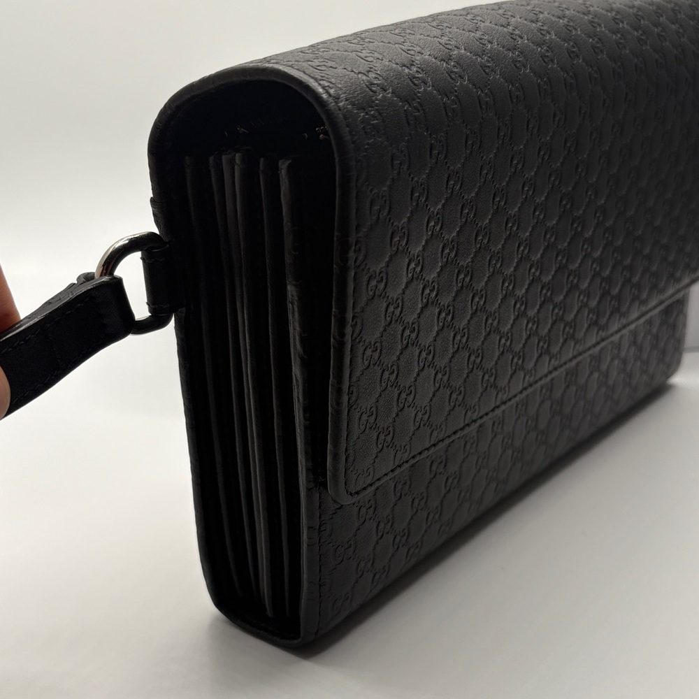Gucci Black Embossed Leather clutch - Picture 2 of 7